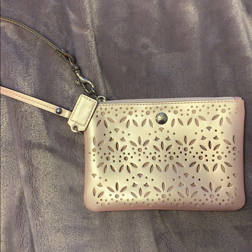 Iridescent/light pink Coach wristlet
